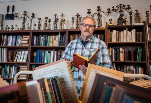 Stephen Recker, Museum Collections volunteer in the museum's rare books collection, photo credit: FNP photo by Katina Zentz